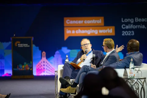 Dr Cary Adams speaking at the 2023 World Cancer Leaders' Summit in Long Beach